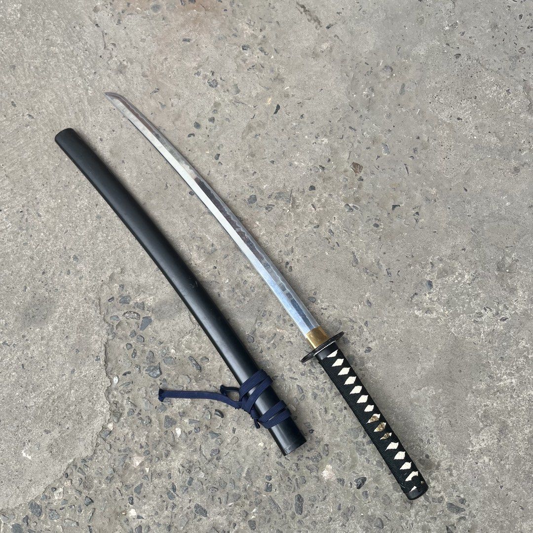 Japanese Katana Sword with Scabbard (Category: Vintage Collectibles) located in San Fernando. Submitted by thethriftwardrobe.ph (Listing ID 1428791597, Image 2). Description: .