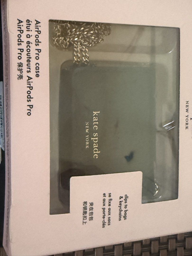 Kate Spade AirPods Pro Case with Chain (Category: Cases & Sleeves) located in Manila. Submitted by deapage (Listing ID 1428682234, Image 1). Description: Kate Spade AirPods Pro case comes with a chain. It is designed to clip to bags and keychains. The case is available in black and green. The Kate Spade logo is visible on the front of the case. It is new and in its original packaging..