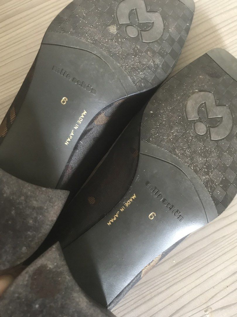 Mila Schön Loafers - Size 6 (Category: Loafers) located in Pasig City. Submitted by mieldecluttersss (Listing ID 1428652621, Image 3). Description: These Mila Schön loafers feature a brown and black design. The shoes are size 6 and made in Japan. The interior of the shoes is marked with the brand name. The soles show some wear. The loafers have a classic loafer design with a square toe..
