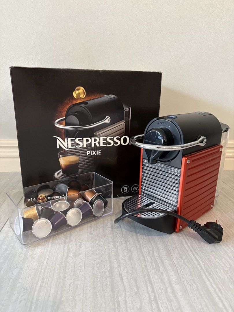 Nespresso Pixie Coffee Machine with Capsules (Category: Coffee Machines & Makers) located in Manila. Submitted by keepingthingsclean (Listing ID 1428681546, Image 1). Description: Nespresso Pixie Red Slightly used over a year Mint condition No issue/ no damages Complete with box Capsules included (container of capsules not included) No low ballers please RFS: Upgraded Location: Ortigas.