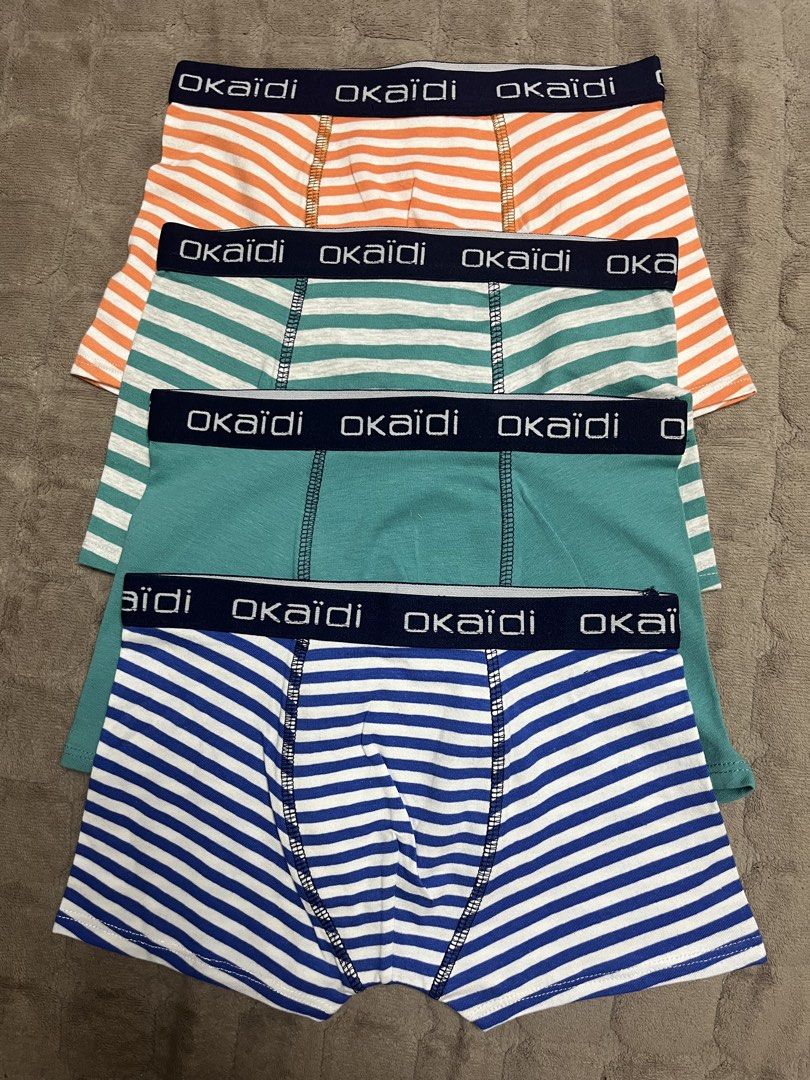 Okaidi Boxer Briefs - Assorted Designs (Category: Babies & Kids Fashion) located in Paranaque City. Submitted by princessann0721 (Listing ID 1428758686, Image 3). Description: Set of Okaidi boxer briefs in various colors and patterns. Includes striped and dinosaur print designs. The waistband features the Okaidi logo. These boxer briefs appear to be made of a soft, comfortable material. Perfect for everyday wear. Avail Sizes: 4A, 6A, 8A, 10A, 12A