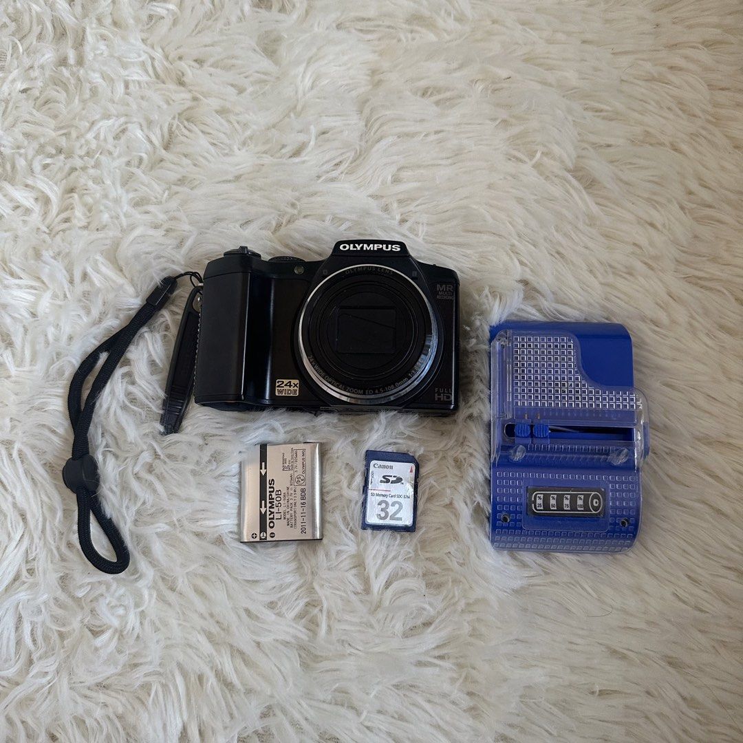 Olympus SZ-31MR 16MP Digital Camera (Category: Cameras) located in Manila. Submitted by helpmedeclutter07 (Listing ID 1428651638, Image 1). Description: Olympus SZ-31 MR ₱6,800.00 💕16 megapixels + 24x optical zoom 💕touch screen 💕can take pictures, can take videos (Full HD 1080р) 💕pop-up flash 💕fully functional: all buttons, video, flash, zoom working Issues: no battery door Inclusions: -battery -camera strap -32mb sd card -universal charger 