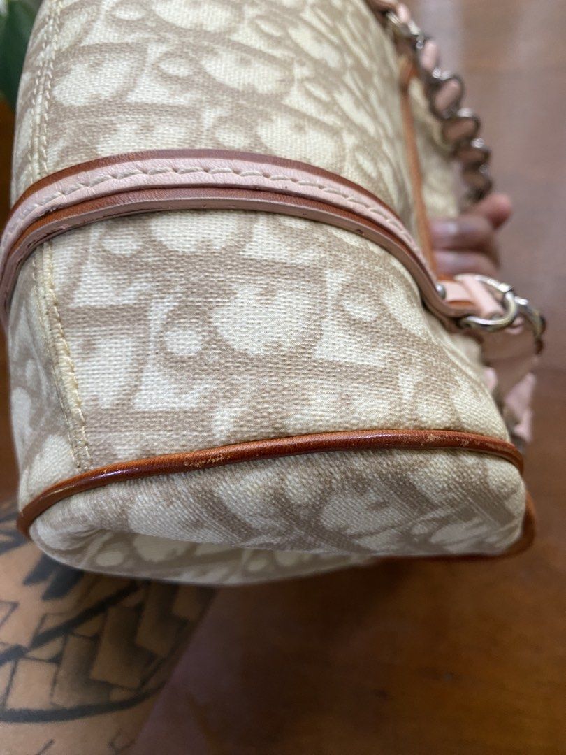 Rare Dior Romantique Trotter (Category: Luxury Bags & Wallets) located in Cebu City. Submitted by gummybearsworld (Listing ID 1428787912, Image 2). Description: - Rare Dior Romantique Trotter Shoulder Bag - Iconic Dior Trotter print in beige - Features leather accents and a heart-shaped lock - A timeless Dior collectible.
