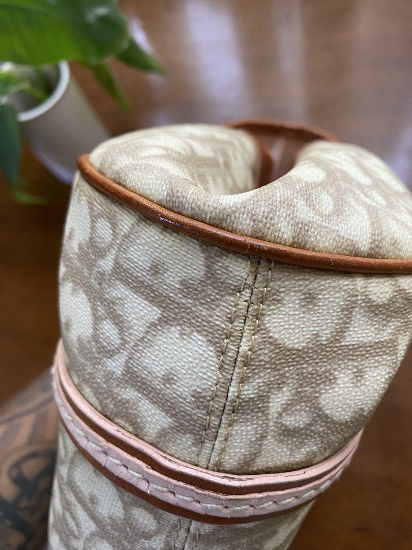 Rare Dior Romantique Trotter (Category: Luxury Bags & Wallets) located in Cebu City. Submitted by gummybearsworld (Listing ID 1428787912, Image 3). Description: - Rare Dior Romantique Trotter Shoulder Bag - Iconic Dior Trotter print in beige - Features leather accents and a heart-shaped lock - A timeless Dior collectible.