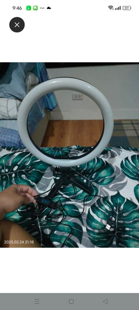 Ring Light with Tripod (Category: Lighting & Studio Equipment) located in Antipolo. Submitted by anyyyyy03 (Listing ID 1428740740, Image 1). Description: Ring light comes with a tripod stand. It has a USB cable for power. It is suitable for various uses, such as video recording or photography..
