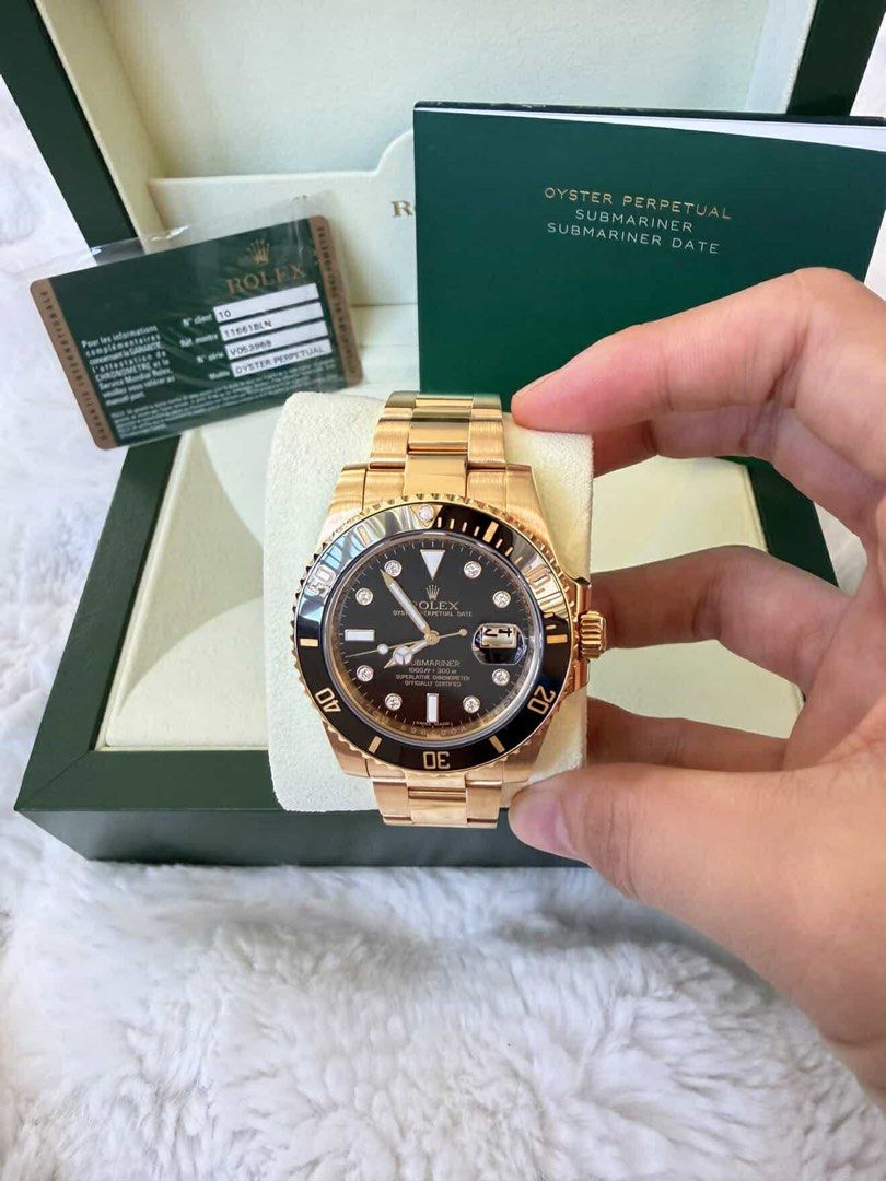Rolex Submariner Date 18k solid gold (Category: Luxury Watches) located in Pasig City. Submitted by Watchaholics (Listing ID 1428671788, Image 1). Description: ROLEX SUBMARINER DATE 18kt Yellow Gold Factory "Serti" Diamond Dial Ref # 116618LN Year 2009 Very Rare V Series Missing 2 links With box & card For 1.999M.
