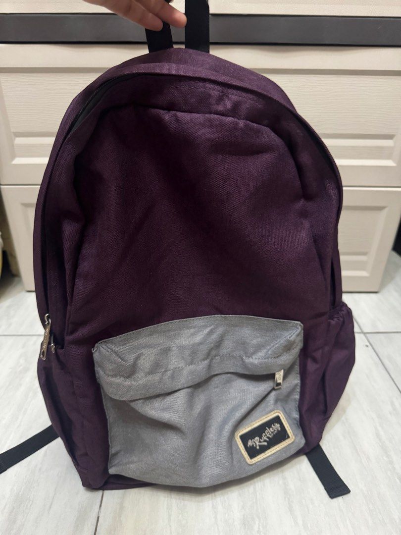 Ruffless Backpack - Purple School Bag/ Laptop Bag (Category: Backpacks) located in Quezon City. Submitted by depot.riri (Listing ID 1428615109, Image 2). Description: Color: Violet Condition: 8/10 Padded Backpack for laptop Great for students Loc: Quezon City MOP: Gcash/Maya/Bank Transfer SF: Lalamove(option for COD w/ addtional fees) .