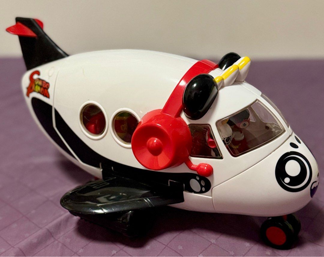 Ryan World’s Combo Panda Airplane Set with 6 Figures (Category: Kids Toys) located in Taguig. Submitted by deklutr_finds (Listing ID 1428655490, Image 1). Description: 1 Airplane 6 Figures complete (1.75 - 2 inch tall plastic figures) Accessories: 1 red trolley, 4 white trays, 1 milk carton, 1 fruit, 1 ice cream, 1 red headphone Storage Feature: Airplane doubles as a storage case when not in play. Rolling Wheels: Functional rolling wheels for eas