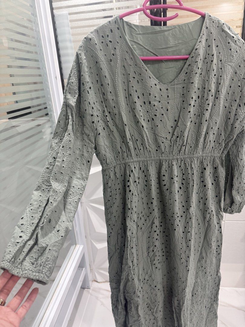 Sage Green Eyelet Maxi Dress (Category: Dresses) located in Arayat. Submitted by ico_riv (Listing ID 1428770018, Image 2). Description: Elegant sage green maxi dress featuring intricate eyelet detailing. It has a flattering V-neckline, long sleeves, and an elasticated waist. Perfect for a casual day out or a special occasion. .