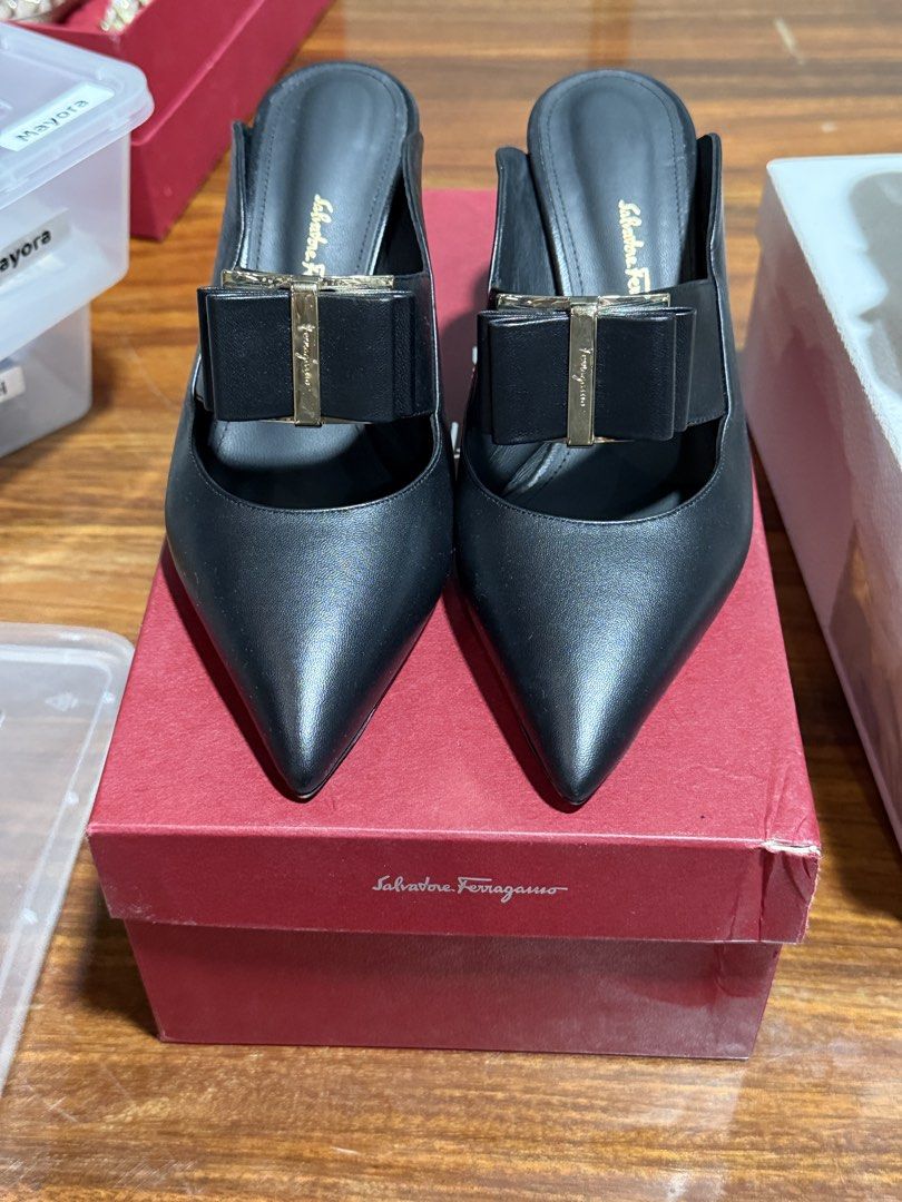 Salvatore Ferragamo Black Bow Heels (Category: Heels) located in Manila. Submitted by cay26 (Listing ID 1428778795, Image 2). Description: -Salvatore Ferragamo Zelda Double Bow Mules -Feature logo-embossed bow on the front, pointed toe and beige leather sole at the base. -Comes with the box. -rank 9.5/10.