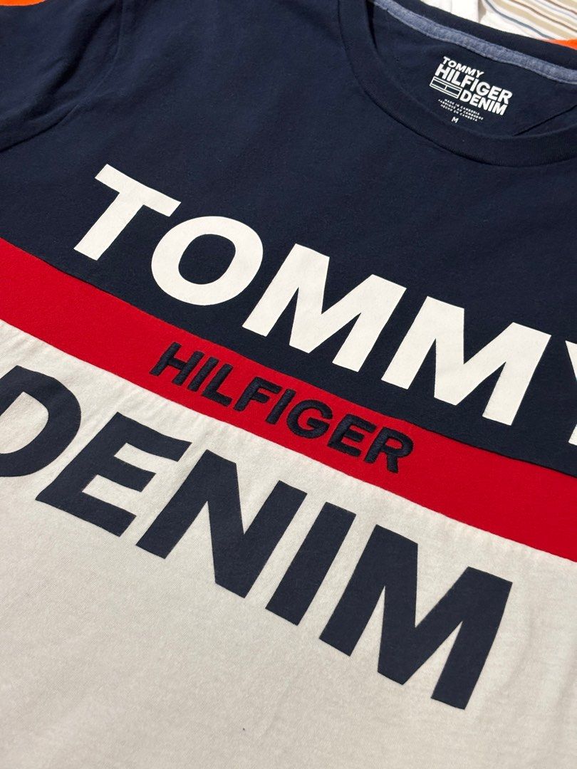 Tommy Hilfiger T-shirt (Category: Tshirts & Polo Shirts ) located in Makati City. Submitted by justeprix (Listing ID 1428764967, Image 3). Description: Like new unisex Tommy Hilfiger T-shirt Authentic purchase from the US rfs: decluttering Size: Medium Chest: 54 cm Length: 70 cm Shoulder: 46 cm Sleeve: 23 cm Shipping from MAKATI CITY via Lalamove, Grab, Angkas Padala, etc. Booking will be set up by Juste Prix and cost will be shouldered by buyer.