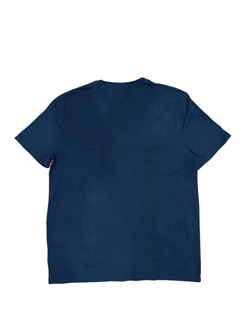 Tommy Hilfiger T-shirt (Category: Tshirts & Polo Shirts ) located in Makati City. Submitted by justeprix (Listing ID 1428764967, Image 2). Description: Like new unisex Tommy Hilfiger T-shirt Authentic purchase from the US rfs: decluttering Size: Medium Chest: 54 cm Length: 70 cm Shoulder: 46 cm Sleeve: 23 cm Shipping from MAKATI CITY via Lalamove, Grab, Angkas Padala, etc. Booking will be set up by Juste Prix and cost will be shouldered by buyer.