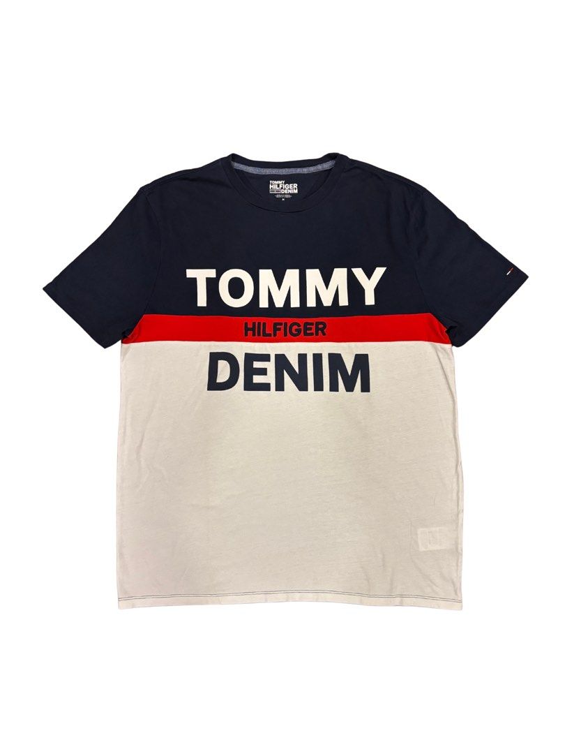 Tommy Hilfiger T-shirt (Category: Tshirts & Polo Shirts ) located in Makati City. Submitted by justeprix (Listing ID 1428764967, Image 1). Description: Like new unisex Tommy Hilfiger T-shirt Authentic purchase from the US rfs: decluttering Size: Medium Chest: 54 cm Length: 70 cm Shoulder: 46 cm Sleeve: 23 cm Shipping from MAKATI CITY via Lalamove, Grab, Angkas Padala, etc. Booking will be set up by Juste Prix and cost will be shouldered by buyer.