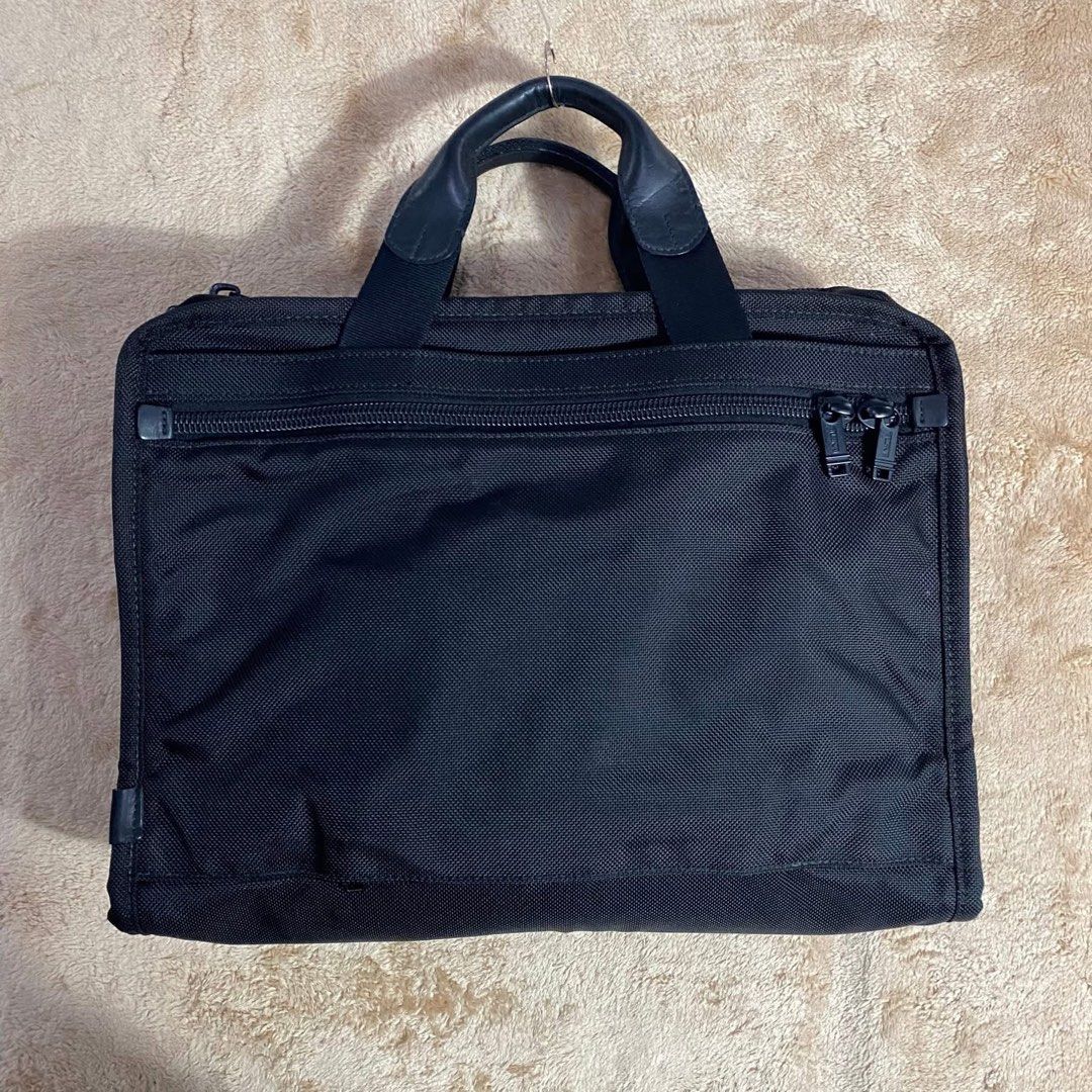 Tumi Black Briefcase (Category: Briefcases) located in Roxas City. Submitted by thrifted.trilogy (Listing ID 1428607770, Image 2). Description: Tumi T-pass Briefcase w/ OG Strap Height: 12.5” Width: 15.5” No issue COD/COP via LBC (Need DP) Location: Western Visayas Negotiable Pm me for more details.