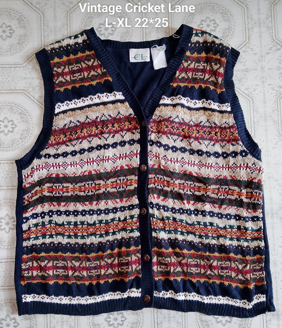 Vintage Cricket Lane Vest (Category: Vests) located in Binan City. Submitted by incnt (Listing ID 1428641708, Image 1). Description: Vintage Cricket Lane vest. Features a button-down front and a V-neck design. The vest has a colorful, patterned design with a navy blue base. The size is L-XL, with measurements of 22x25. The vest has a tag that says "CL" and "Cricket Lane". "All brand names, logos, and images are registered trademarks of their resp