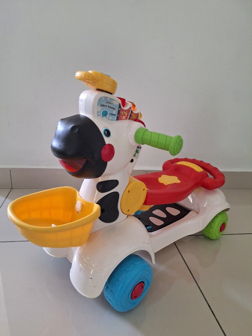 VTech 3 in 1 Zebra Scooter, Babies & Kids, Infant Playtime on Carousell