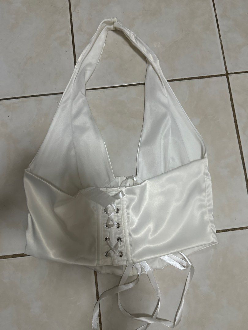 White Satin Halter Corset Top (Category: Sleeveless) located in Navotas City. Submitted by dr3ssto1mpress (Listing ID 1428653940, Image 2). Description: Rfs: not needed anymore, used once for performance Perfect for parties Corset top.