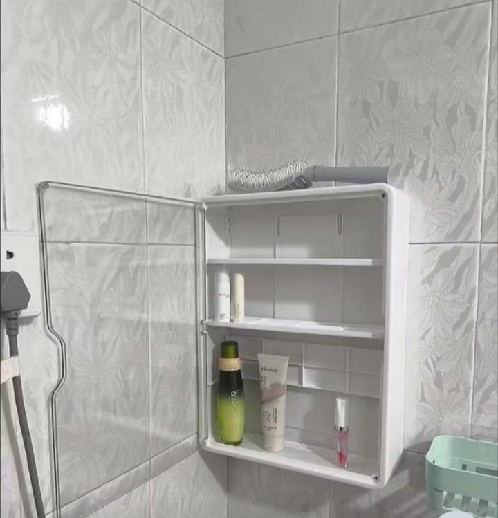 White Wall-Mounted Storage Cabinet (Category: Shelves, Cabinets & Racks) located in Manila. Submitted by alayassulittipidfinds (Listing ID 1428743671, Image 1). Description: White wall-mounted storage cabinet is perfect for organizing items in your bathroom or any room. It features a clear door and multiple shelves for storage. The cabinet is designed to be mounted on the wall, saving space and keeping your items accessible. It is ideal for stori