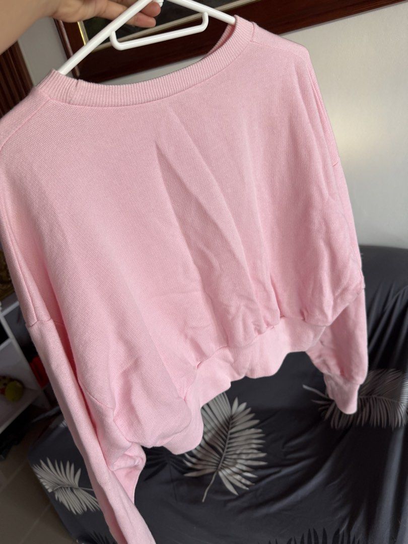 Zara Trafaluc Pink Crop Sweatshirt (Category: Longsleeves) located in Marikina City. Submitted by declutter_keni24 (Listing ID 1428695246, Image 3). Description: There are small stain barely noticeable nman see photos.