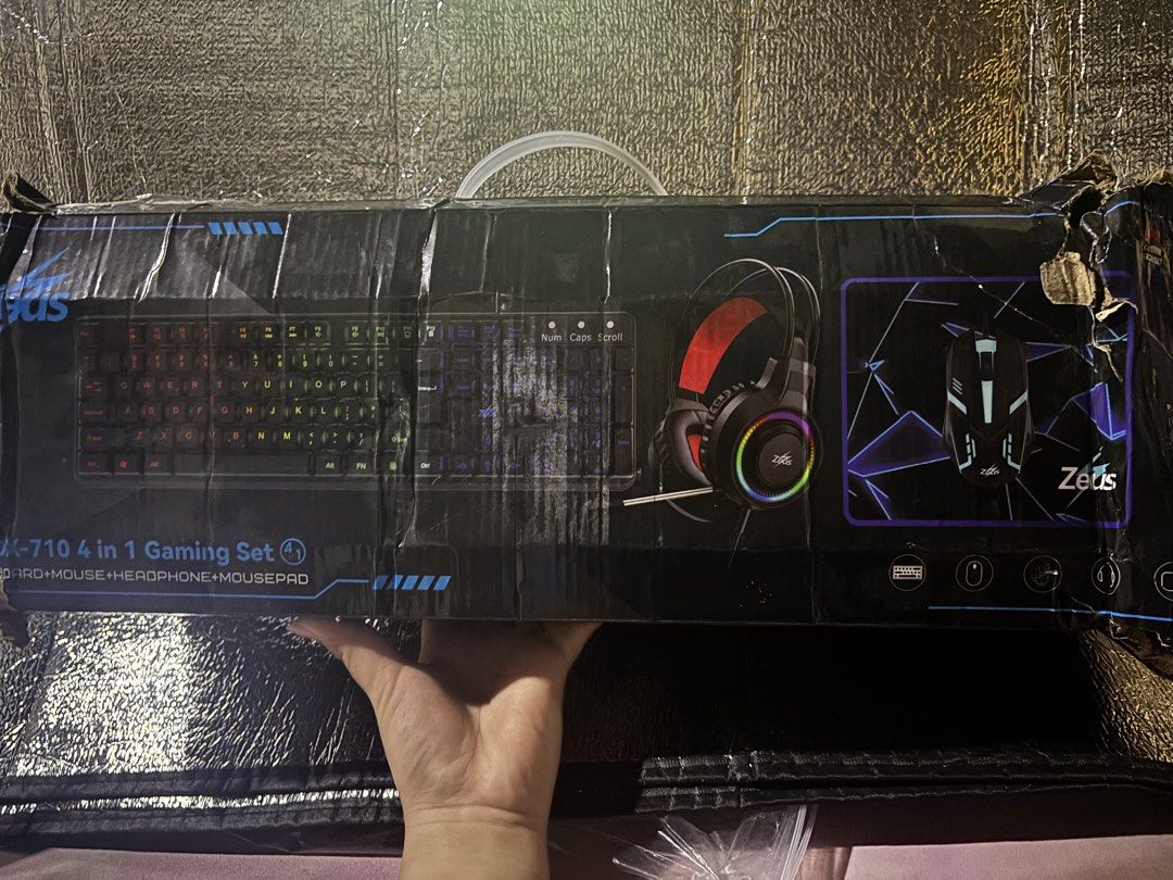 Zeus ZBOX-710 Professional Gaming Keyboard and Mouse Bundle (Category: Computer Keyboard) located in Quezon City. Submitted by lottiebunny (Listing ID 1428625730, Image 2). Description: Zeus ZBox-710 4 in 1 Gaming Set Brand New Includes: Wired Keyboard Wired Mouse Wired Headphones Mouse Pad Note: May sira lang yung box pero working po sya.