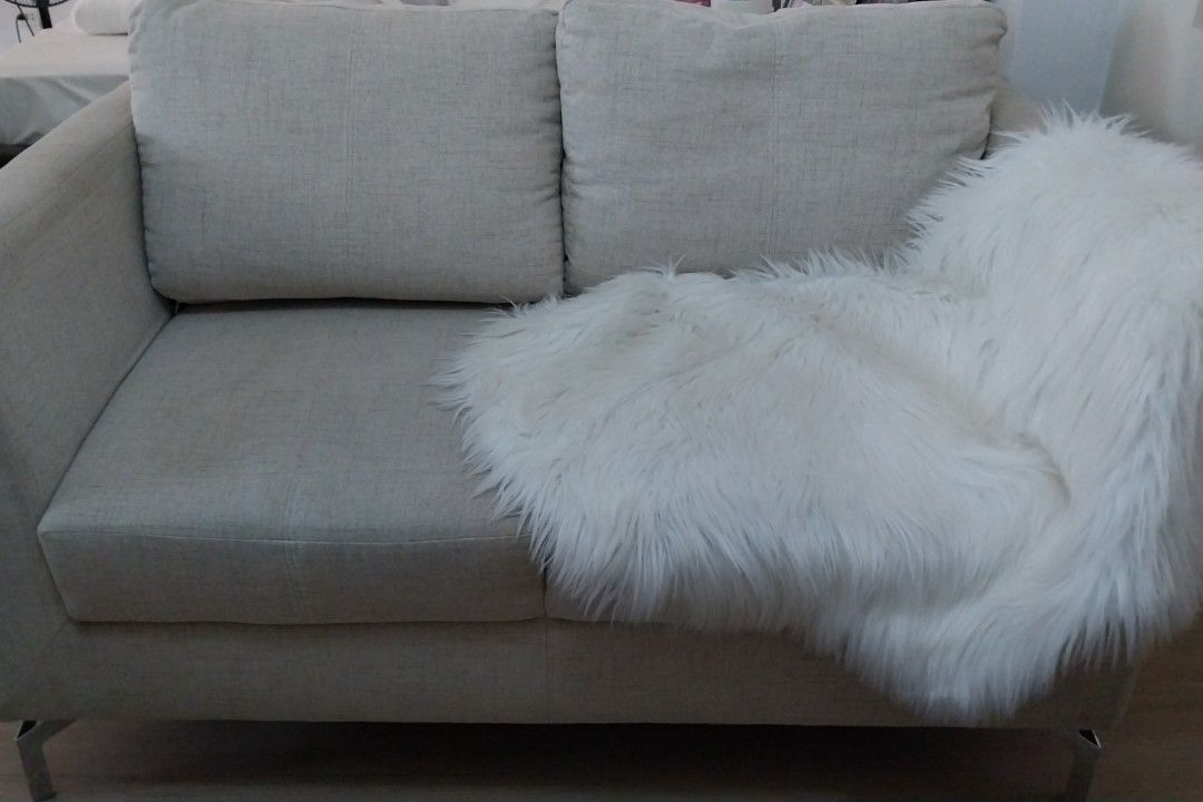 2-Seater Sofa with Fur Throw (Category: Sofas) located in Manila. Submitted by nyeragiti (Listing ID 1428831524, Image 2). Description: mandaue home 2 seater sofa. slightly used and in excellent condition, except the slight burn caused by blower. with 4 removable and washable pillows. .