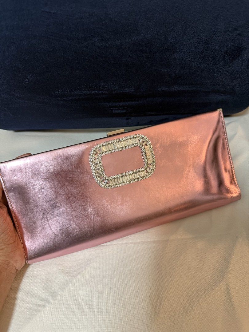 ♥️ Roger Vivier Efflorescence Pink Clutch (Category: Luxury Bags & Wallets) located in Mandaue City. Submitted by closet.confidenti0 (Listing ID 1428807630, Image 1). Description: AUTHENTIC ROGER VIVIER EFFLORESCENCE CLUTCH | PINK | EXCELLENT CONDITION| CEBU | SHIPS NATIONWIDE Roger Vivier Crystal Efflorescence Clutch – Pink Elegant pink satin evening clutch with crystal embellishments. Perfect for formal events or weddings. Beautiful statement p