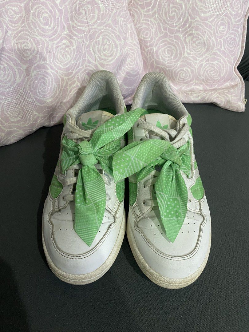 Adidas Continental 80s Green Sneakers (Category: Sneakers) located in Manila. Submitted by ayodizon (Listing ID 1428813014, Image 1). Description: Adidas Continental 80s sneakers in white and green. Features green accents on the sides and heel, with green patterned fabric tied as laces. The Adidas logo is visible on the tongue and heel. Size is US 6.5, UK 6, and FR 39 1/3. Made in Indonesia..