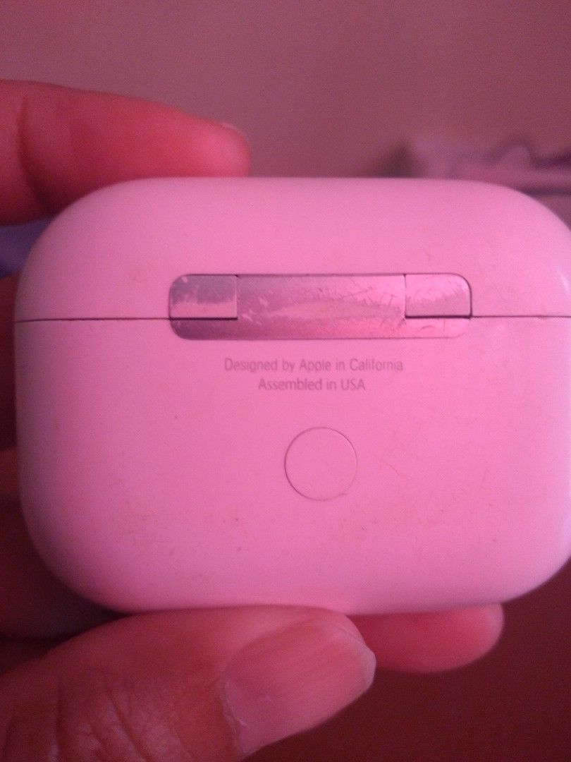 Apple AirPods Pro (Category: Earphones) located in Dasmarinas. Submitted by mspaupreloveditems (Listing ID 1428846023, Image 1). Description: Apple AirPods Pro 1st gen A2803 with charging case. The case has a button and a charging port. The earbuds are white and have a black mesh on the earbud. The case is marked "Designed by Apple in California Assembled in USA". issue: no left airpods no charger pwede sa andriod malakas ang sounds kahit right l