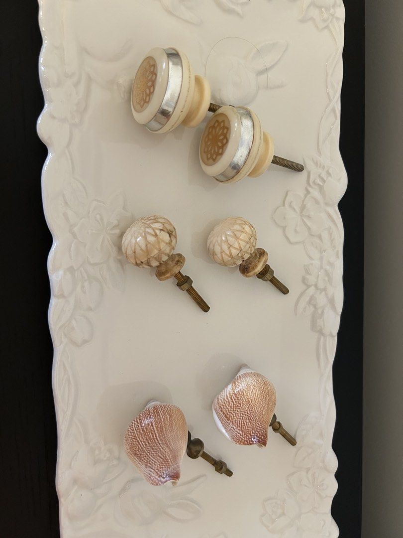 Assorted Decorative Cabinet Knobs (Category: Shelves, Cabinets & Racks) located in Singapore. Submitted by carolineloy (Listing ID 1428838597, Image 2). Description: $2 per knob or $16 for all. The silver knobs have never been used-bought from Zara Home (Barcelona).