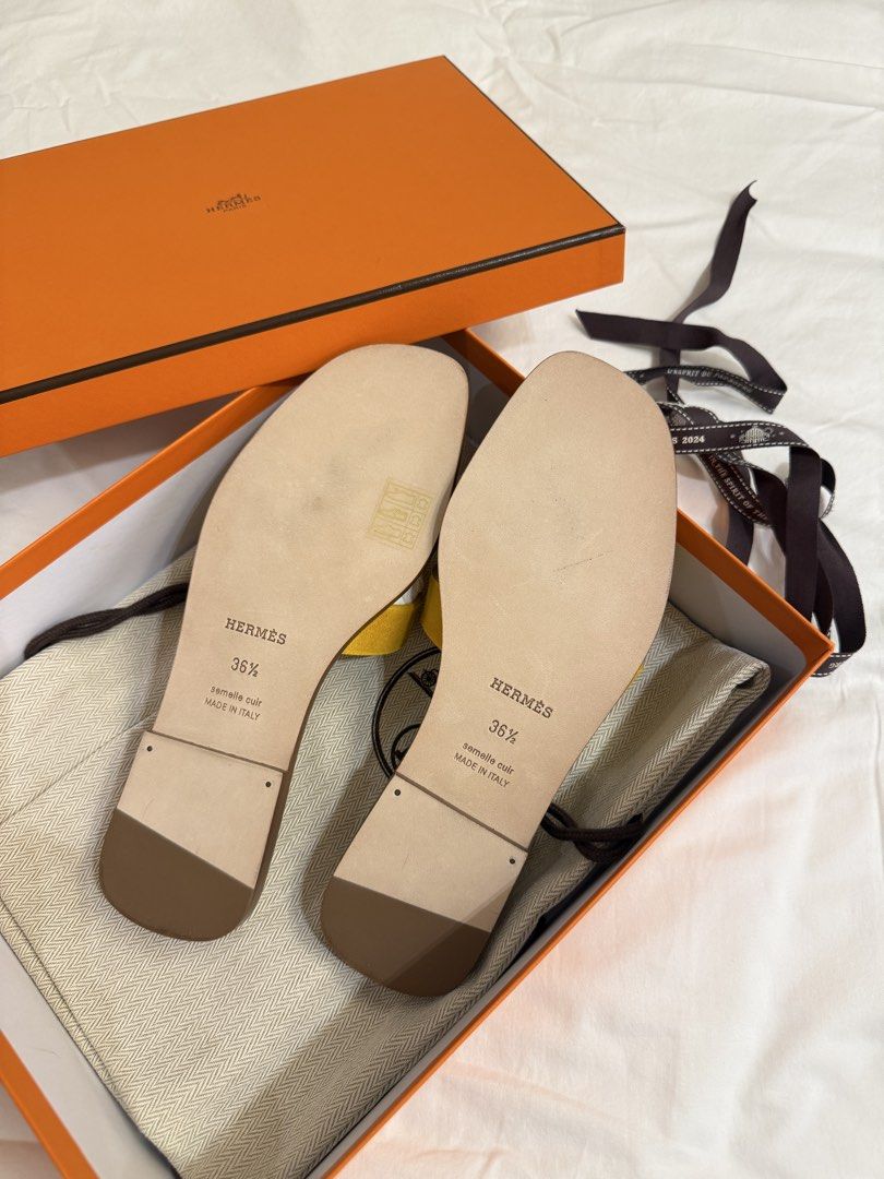 BRAND NEW Hermes Oran Sandals (Category: Flats & Sandals) located in Quezon City. Submitted by glc89 (Listing ID 1428806249, Image 2). Description: Hermes Oran Sandals Jaune Bouton (Yellow) Suede Goatskin Size 36.5.