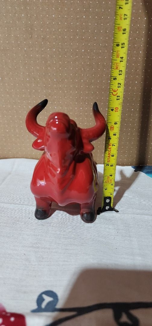 Ceramic red bull (Category: Other Home Decor) located in Baguio. Submitted by coffeesilvershadow_28 (Listing ID 1428940250, Image 2). Description: - From HK box- second-hand - Good condition - 12*7*10 cm - Baguio dropping - Jnt shipping- Payment first plus sf before shipping.