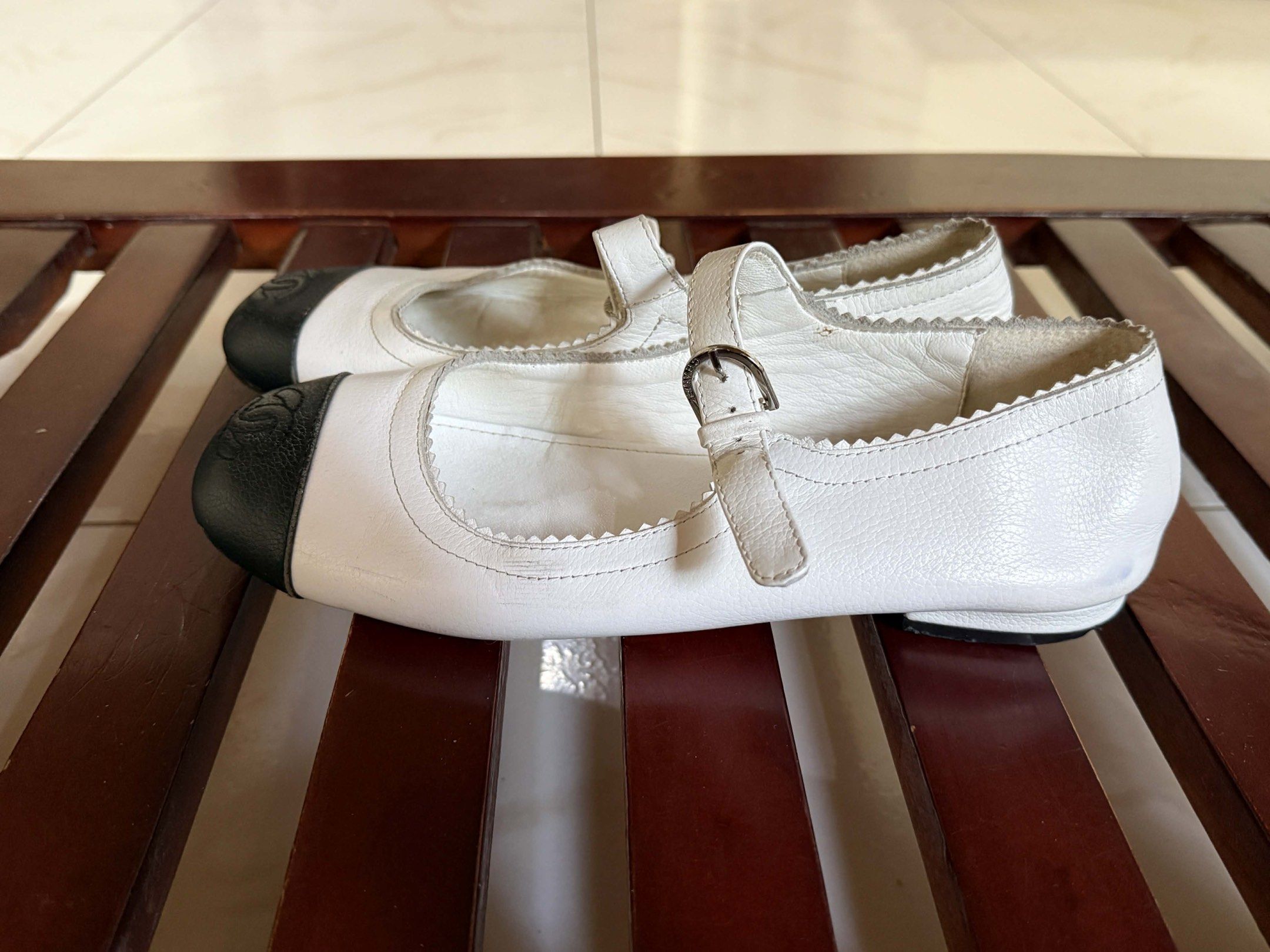 Chanel Cap-Toe Mary Jane Flats (Category: Flats & Sandals) located in Santa Rosa. Submitted by allthings_decluttered (Listing ID 1428820788, Image 2). Description: Chanel cap-toe calf skin mary jane flats bought from another seller for 1,700 have not used it yet rfs: does not fit me size: 38C, good for toes with wide feet in good condition.