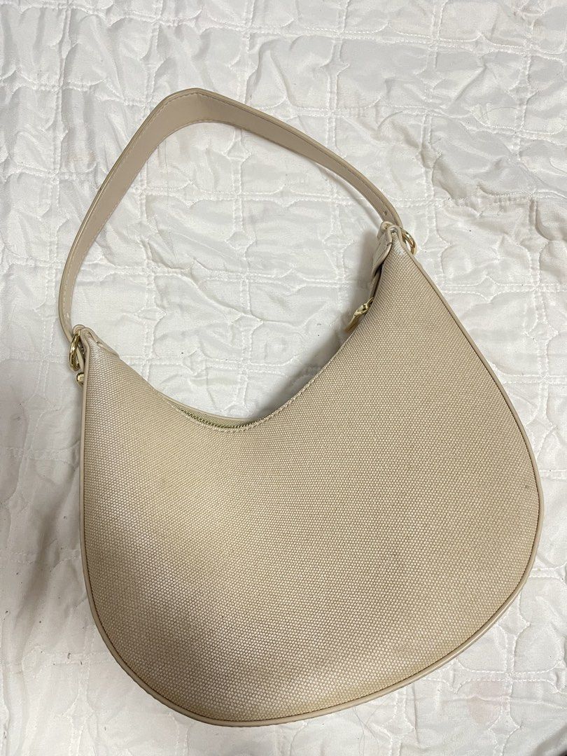 CLN Beige Shoulder Bag (Category: Luxury Bags & Wallets) located in Manila. Submitted by declutteringirliepop (Listing ID 1428929752, Image 2). Description: - CLN Beige Shoulder Bag - Stylish and versatile design - Neutral beige color ( slightly damaged with the color since natambak ).