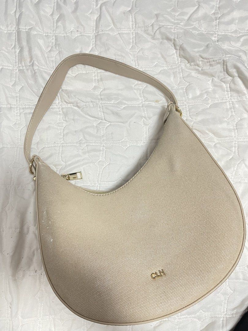 CLN Beige Shoulder Bag (Category: Luxury Bags & Wallets) located in Manila. Submitted by declutteringirliepop (Listing ID 1428929752, Image 1). Description: - CLN Beige Shoulder Bag - Stylish and versatile design - Neutral beige color ( slightly damaged with the color since natambak ).