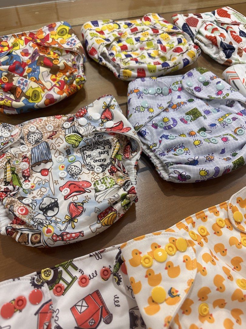 Cloth Diapers with Inserts (Category: Diapers & Baby Wipes) located in Pasig City. Submitted by mrsmangahas19 (Listing ID 1428960587, Image 3). Description: In very good condition. SRP is between 80-150 pesos each shell only Liner is sold at ₱45 each. Selling for only ₱100 shell + 2pcs liner Take all for ₱ 900 (10pcs shell + 22 liner).