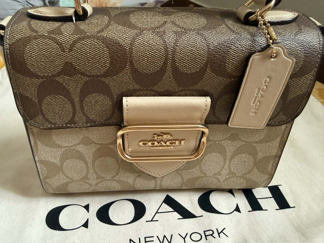 Coach Morgan Top Handle Satchel Bag (Category: Luxury Bags & Wallets) located in Caloocan City. Submitted by kym333 (Listing ID 1428888194, Image 1). Description: Guaranteed Authentic‼️ NEGOTIABLE TO SURE BUYER Used once! In pristine condition Malinis, makinis pwedeng pwede sa maarte at maselan. NO ISSUE! What you see is what you get. Check all you want Actual pic posted.
