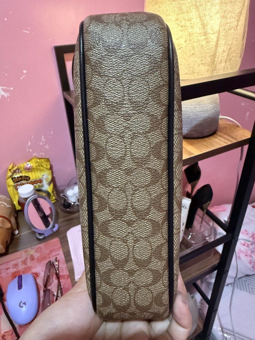 Coach Signature Nolita (Category: Luxury Bags & Wallets) located in Las Pinas. Submitted by emjey_ (Listing ID 1428983939, Image 3). Description: Dm if interested ☺️ authentic 💯 .