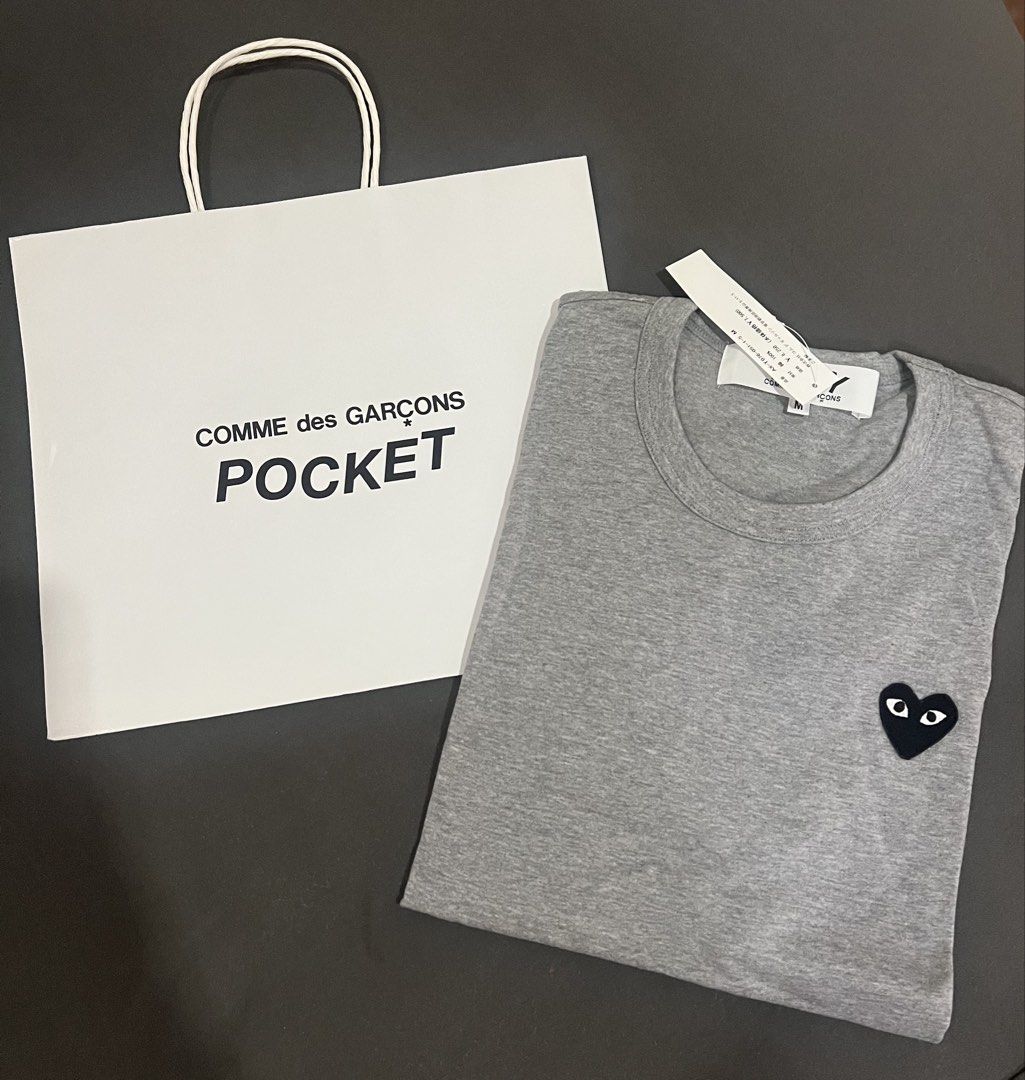 Comme des Garcons Play Pocket T-shirt (Category: Shirts) located in Quezon City. Submitted by worldofC (Listing ID 1428812751, Image 1). Description: Brand new Bought this in Japan Authentic With paper bag Unisex.