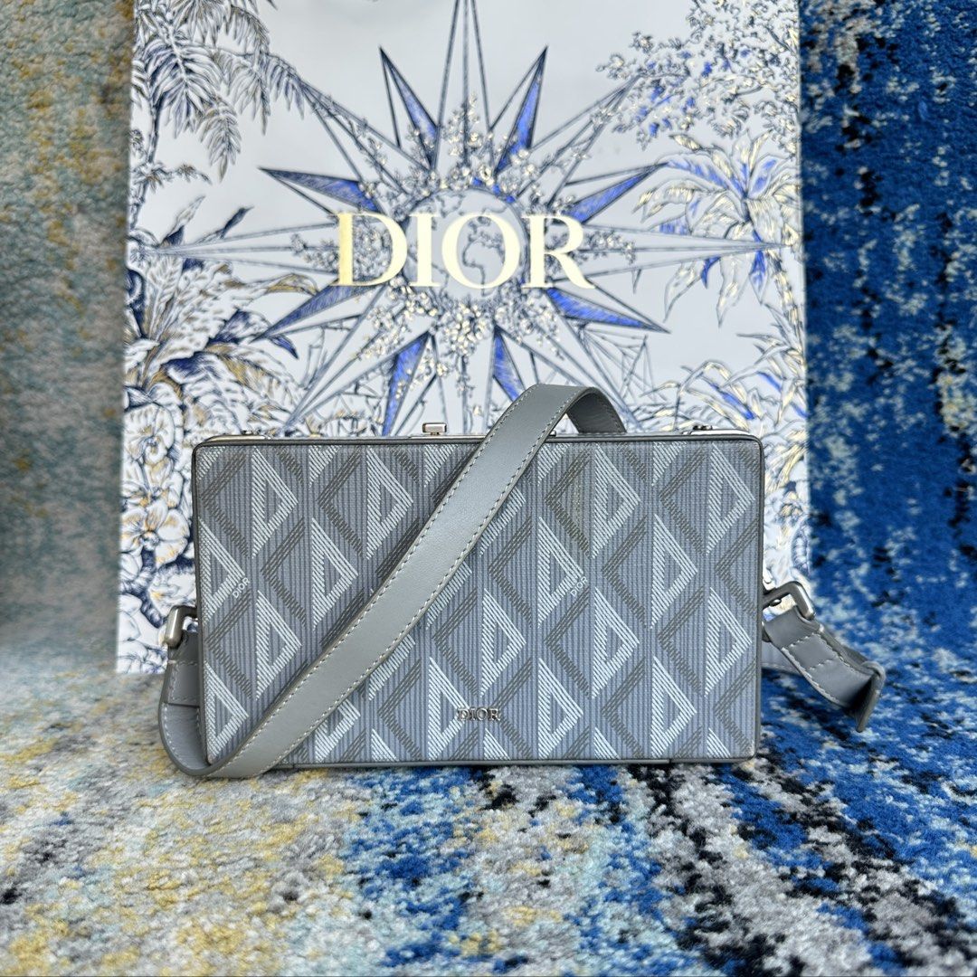 Dior Lock Mini Case Bag With Strap Reversible (Category: Luxury Bags & Wallets) located in Paranaque City. Submitted by changingclassic (Listing ID 1428942530, Image 1). Description: Dior Lock Mini Case Bag With Strap Reversible -Authentic 💯 -Includes paperbag, dustbag, entrupy -Actual photos posted, what you see what you get -Sign of used kindly check all the attached photos DM FOR INTERESTED.