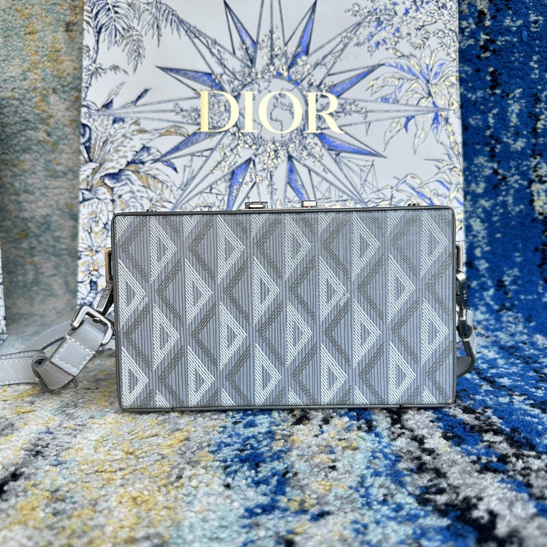 Dior Lock Mini Case Bag With Strap Reversible (Category: Luxury Bags & Wallets) located in Paranaque City. Submitted by changingclassic (Listing ID 1428942530, Image 2). Description: Dior Lock Mini Case Bag With Strap Reversible -Authentic 💯 -Includes paperbag, dustbag, entrupy -Actual photos posted, what you see what you get -Sign of used kindly check all the attached photos DM FOR INTERESTED.