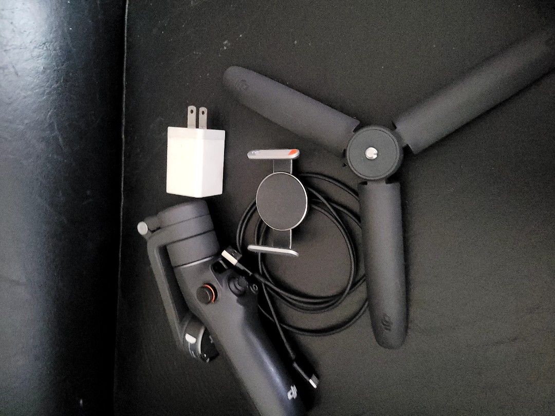 DJI Osmo Mobile 6 (Category: Gimbals & Stabilizers ) located in Quezon City. Submitted by fteo68985 (Listing ID 1428854675, Image 1). Description: DJI Osmo Mobile 6 in very good condition. Battery lasts 5 to 6 hrs. Perfect working condition. Great with iPhone handsets. No case. Includes adaptor, clamp, cable and stand attachment. Super low price, grab it now!..