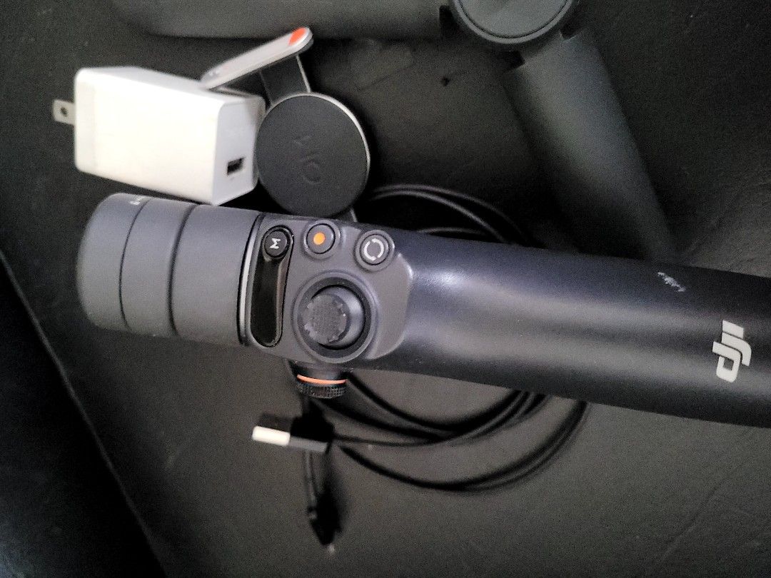 DJI Osmo Mobile 6 (Category: Gimbals & Stabilizers ) located in Quezon City. Submitted by fteo68985 (Listing ID 1428854675, Image 2). Description: DJI Osmo Mobile 6 in very good condition. Battery lasts 5 to 6 hrs. Perfect working condition. Great with iPhone handsets. No case. Includes adaptor, clamp, cable and stand attachment. Super low price, grab it now!..