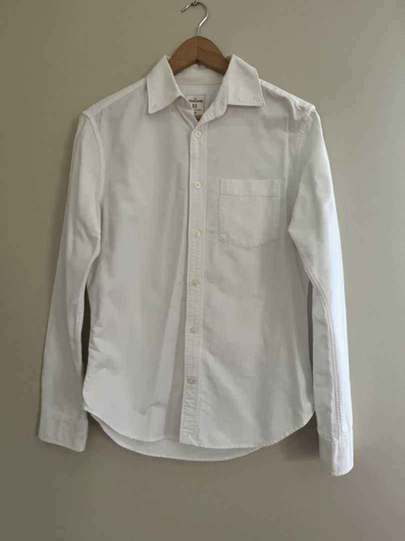 Gap White Oxford Button-down Shirt (Category: Formal Shirts) located in Quezon City. Submitted by reviverevolution (Listing ID 1428878891, Image 3). Description: - Gap Oxford Button-down Shirt - Color: White - Size: XS (Men’s size) - Measurement: Pit to pit 19 inches; length 26 inches - Payment Methods: GCash / BPI / BDO - Delivery via LBC / J&T pick-up / Lalamove pick-up. Delivery fee and pick-up booking c/o buyer. - All sales are final..