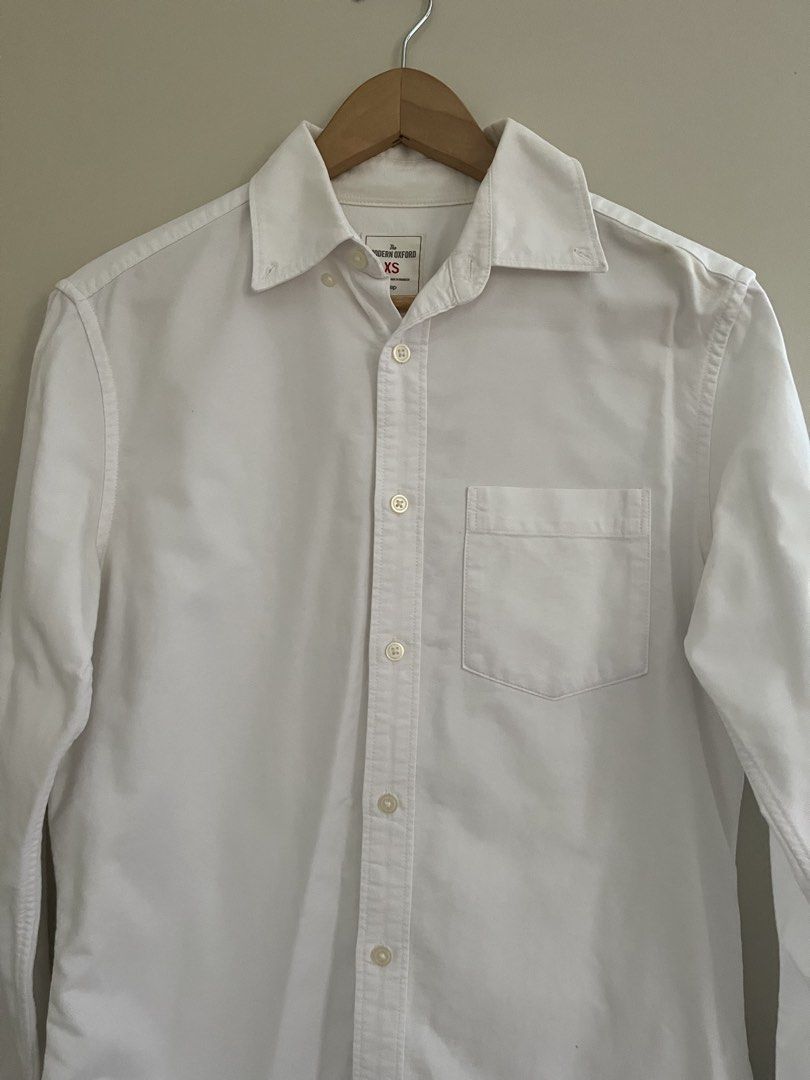 Gap White Oxford Button-down Shirt (Category: Formal Shirts) located in Quezon City. Submitted by reviverevolution (Listing ID 1428878891, Image 1). Description: - Gap Oxford Button-down Shirt - Color: White - Size: XS (Men’s size) - Measurement: Pit to pit 19 inches; length 26 inches - Payment Methods: GCash / BPI / BDO - Delivery via LBC / J&T pick-up / Lalamove pick-up. Delivery fee and pick-up booking c/o buyer. - All sales are final..