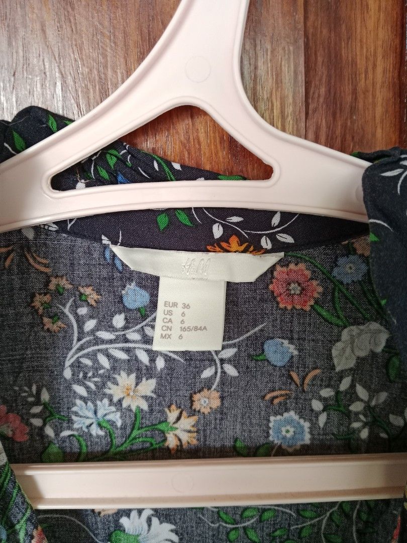 H&M Floral Dress (Category: Dresses) located in Oras. Submitted by preloved4less88 (Listing ID 1428801081, Image 3). Description: H&M dress features a beautiful floral print. It has long sleeves and a collared neckline with ruffle details. It is a knee-length dress, perfect for casual wear or dressing up. The fabric looks lightweight and comfortable..
