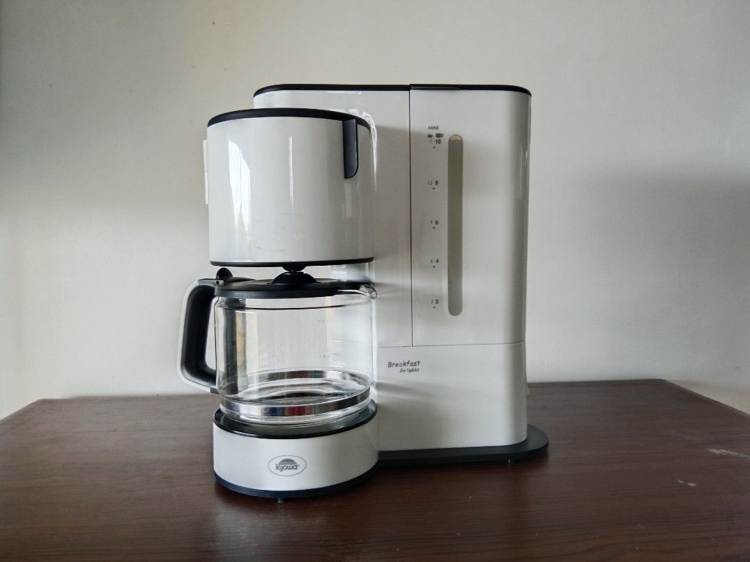 KYOWA Coffee Maker, 10 Cup, White, Watts 900 (Category: Coffee Machines & Makers) located in Bayambang. Submitted by lucky_faststar_74a229 (Listing ID 1428823041, Image 1). Description: Compatibility: 900 Watts, 230 V, AC 60Hz Can make 10 cups Used ground coffee Coffee filter have signs of coffee stains because of used. Some missing rubber bottom feet..