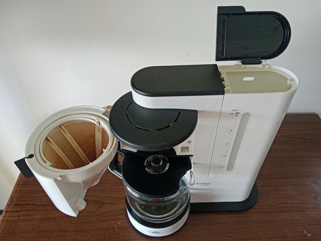 KYOWA Coffee Maker, 10 Cup, White, Watts 900 (Category: Coffee Machines & Makers) located in Bayambang. Submitted by lucky_faststar_74a229 (Listing ID 1428823041, Image 2). Description: Compatibility: 900 Watts, 230 V, AC 60Hz Can make 10 cups Used ground coffee Coffee filter have signs of coffee stains because of used. Some missing rubber bottom feet..