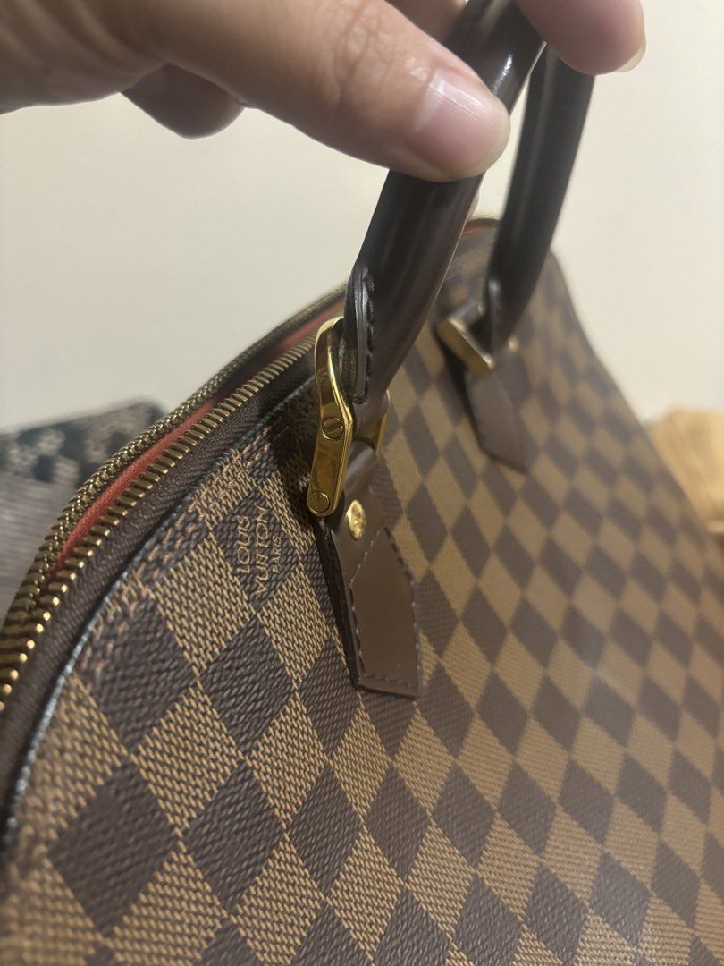 Louis Vuitton Alma Damier Ebene Handbag (Category: Luxury Bags & Wallets) located in Angeles City. Submitted by anythingonlineph (Listing ID 1428983238, Image 2). Description: No more box, just the dustbag. Prestine condition overall, check the uploaded photos. Bawal sa walang budget or middleman, strictly direct buyer-seller transactions only. I do not meet up anymore, super daming flakers at paawa effects upon meeting up. LalaMove same day deli