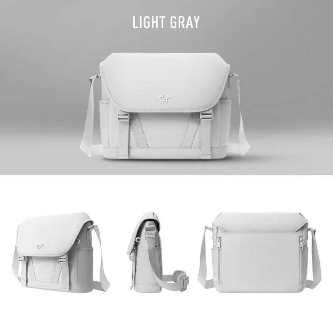 MAH Light Gray Messenger Bag (Unisex) (Category: Sling Bags) located in Quezon City. Submitted by amoree.shop (Listing ID 1428884544, Image 1). Description: HELLO! PLEASE READ ✨ Actual Photo Posted. - Light gray messenger bag - Adjustable shoulder strap - Multiple compartments for organization - Includes side pockets and zippered main compartment - Perfect for carrying wallet, tablet, phone, tissue, cup, and umbrella - Dimensions: Approximately 3