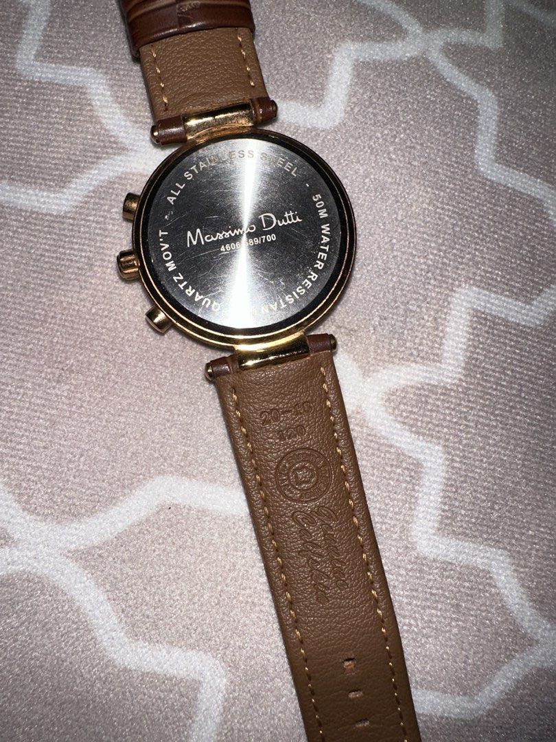 Massimo Dutti watch with genuine leather strap (Category: Luxury Watches) located in Manila. Submitted by pmrshops1 (Listing ID 1428909949, Image 2). Description: Battery needs replacement Cartier pasha inspired design Dark brown genuine leather strap (adjustable) .